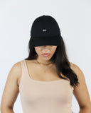 Model wearing the No Hat, close-up front view