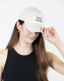Model wearing the Barely Tolerable Hat, close-up front view