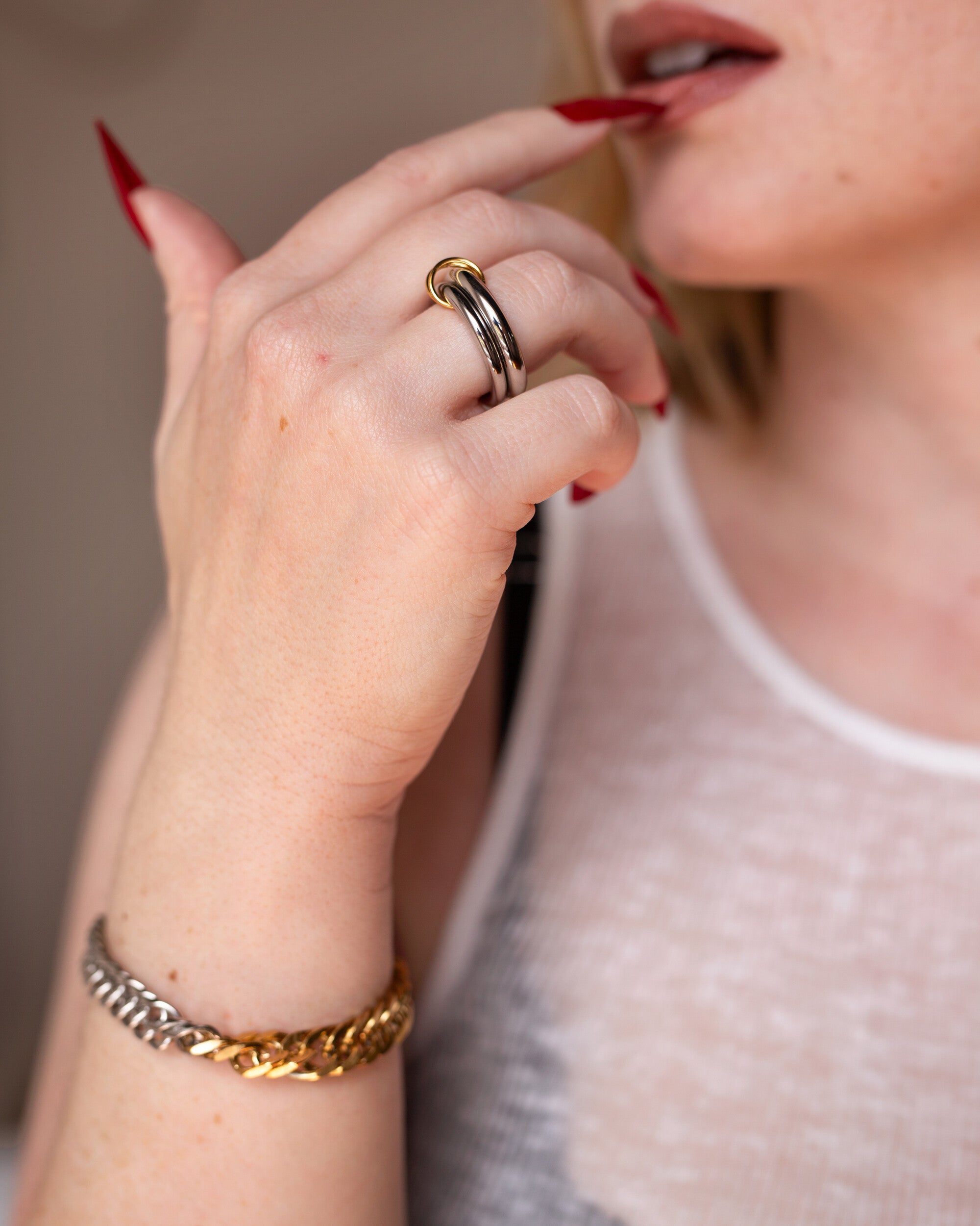 Ara Bracelet, a mixed-metal 18K Gold PVD clasp bracelet.