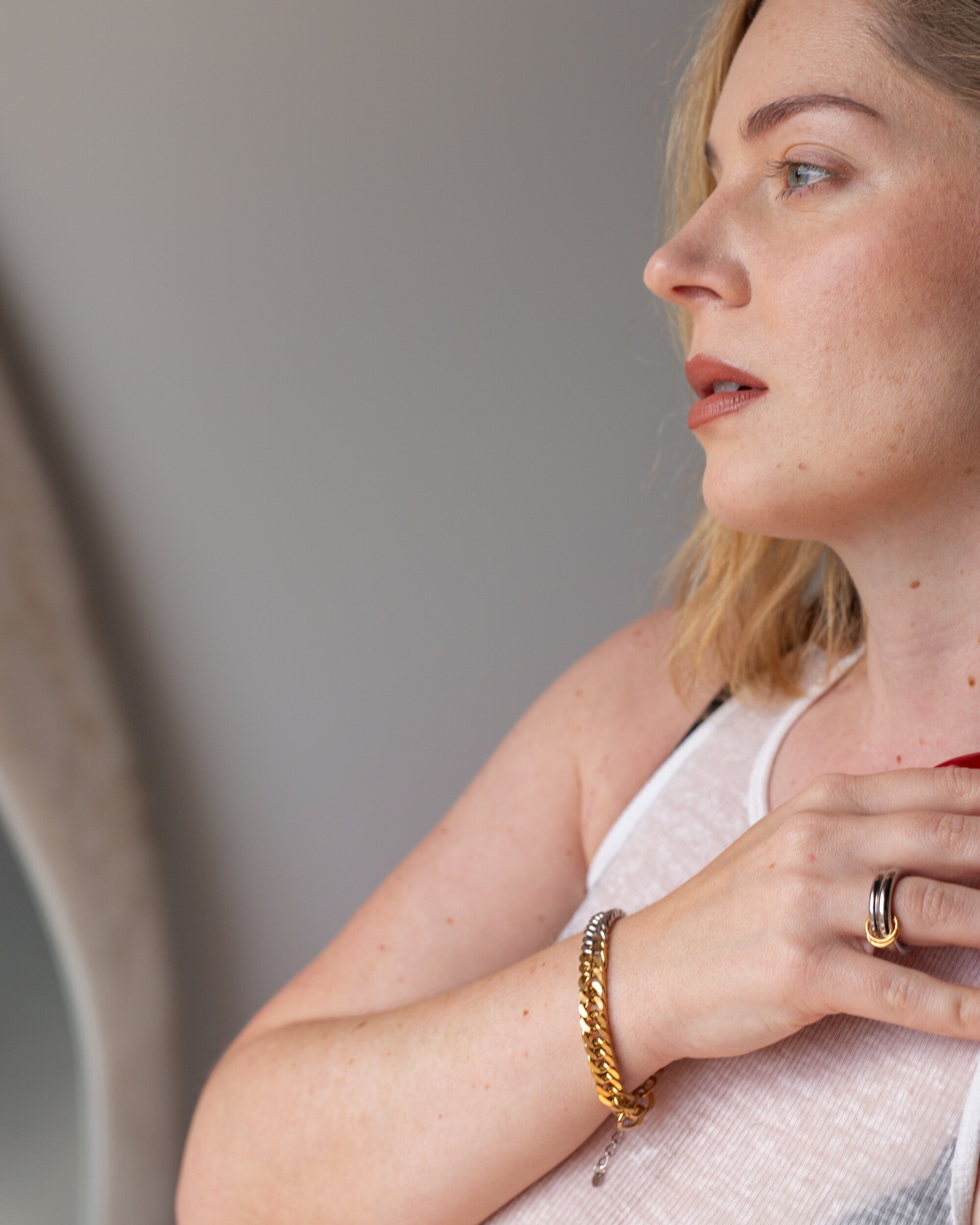 Ara Bracelet, a mixed-metal 18K Gold PVD clasp bracelet.
