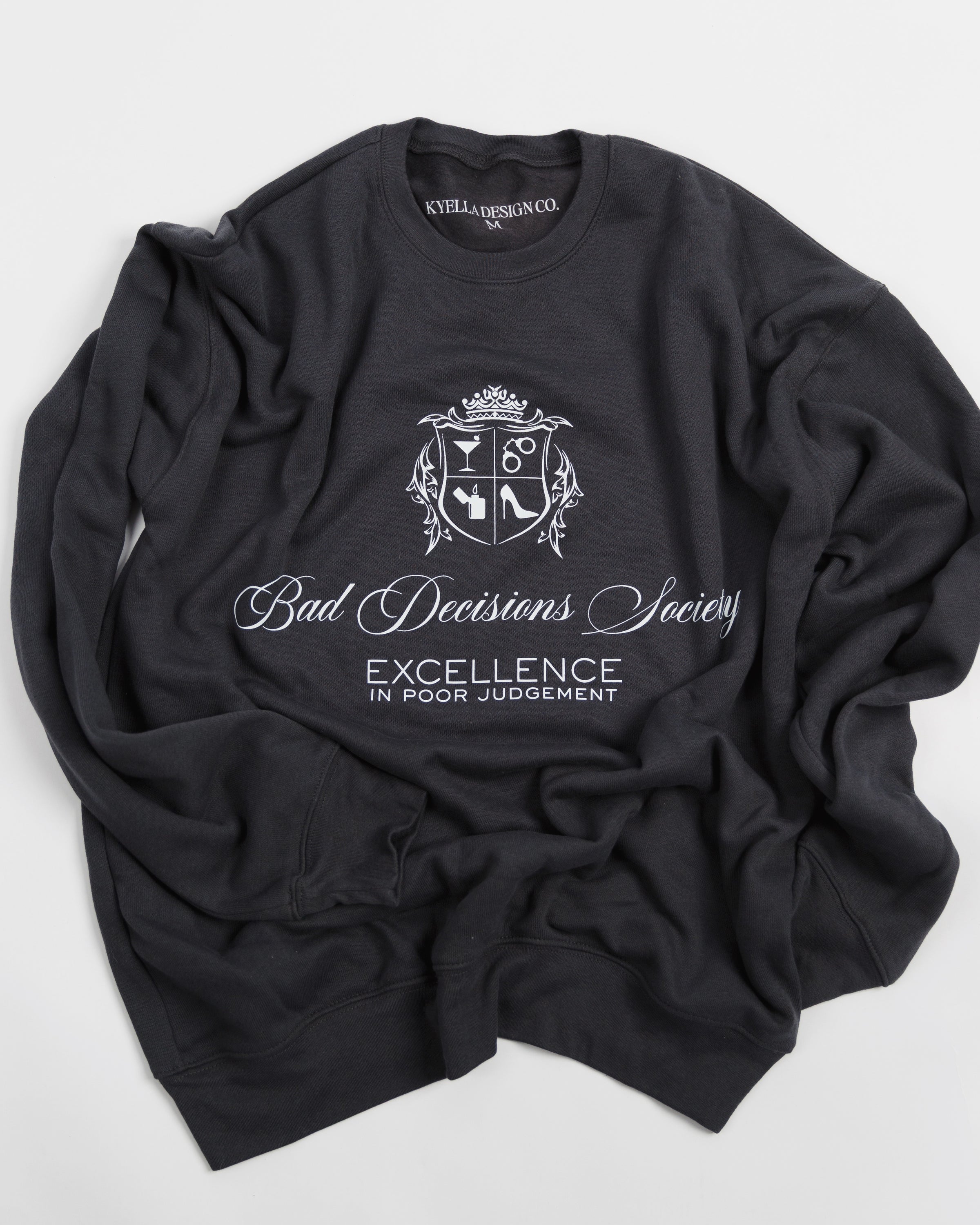 Detail view of the Bad Decisions Society black crewneck sweatshirt.