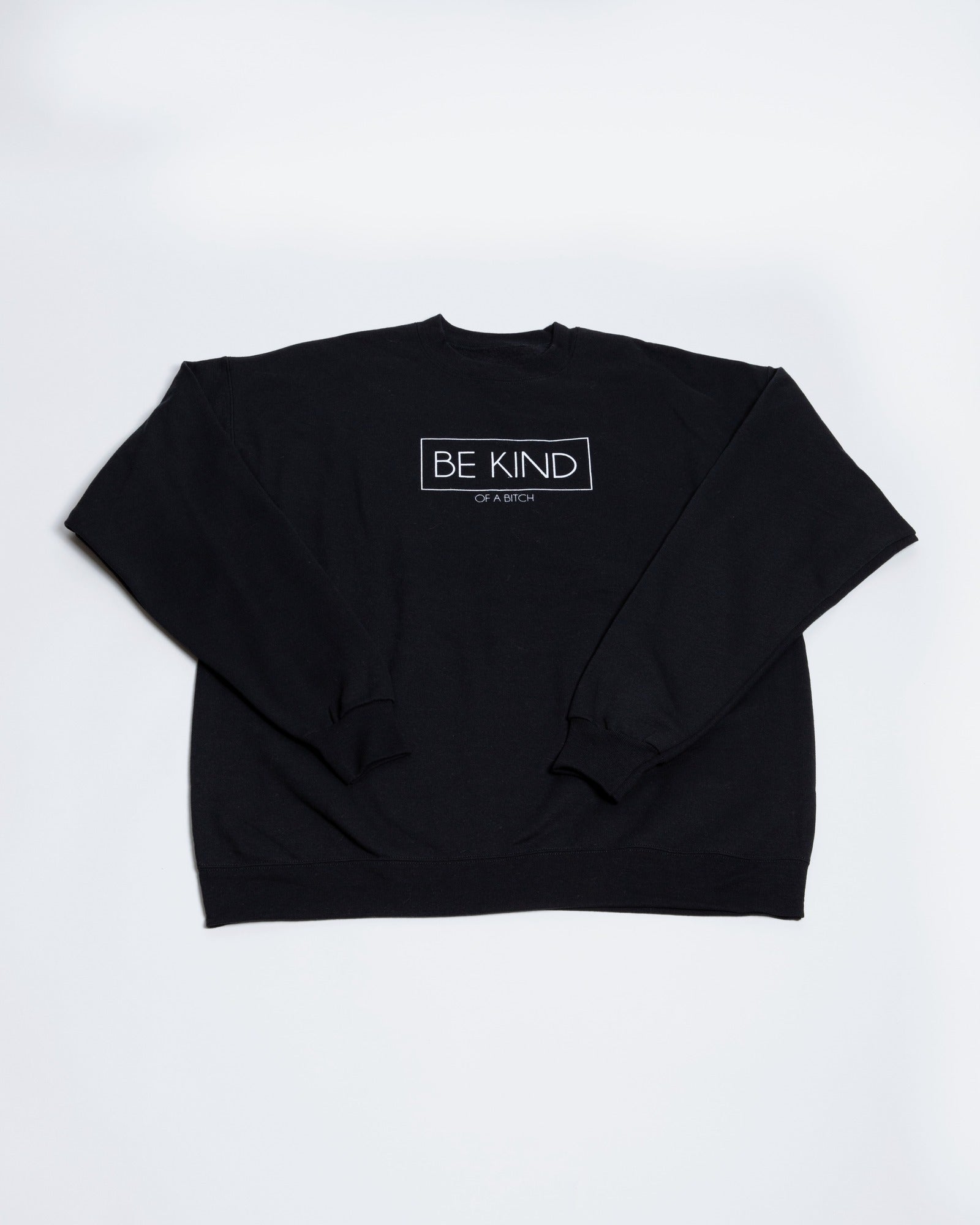 Black Be Kind of a Bitch crewneck sweatshirt laid flat.