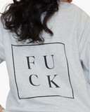 Back of a heather-gray crewneck sweatshirt with a large black outlined square containing the letters F U C K.