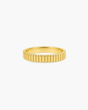 Polished gold-tone Euthenia band ring with evenly spaced vertical ridges creating a fluted texture on a white background.