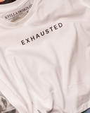 White cropped tee reading EXHAUSTED.