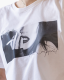 White crewneck T-shirt with a black-and-white editorial image and handwritten Feisty & Non-Compliant text.