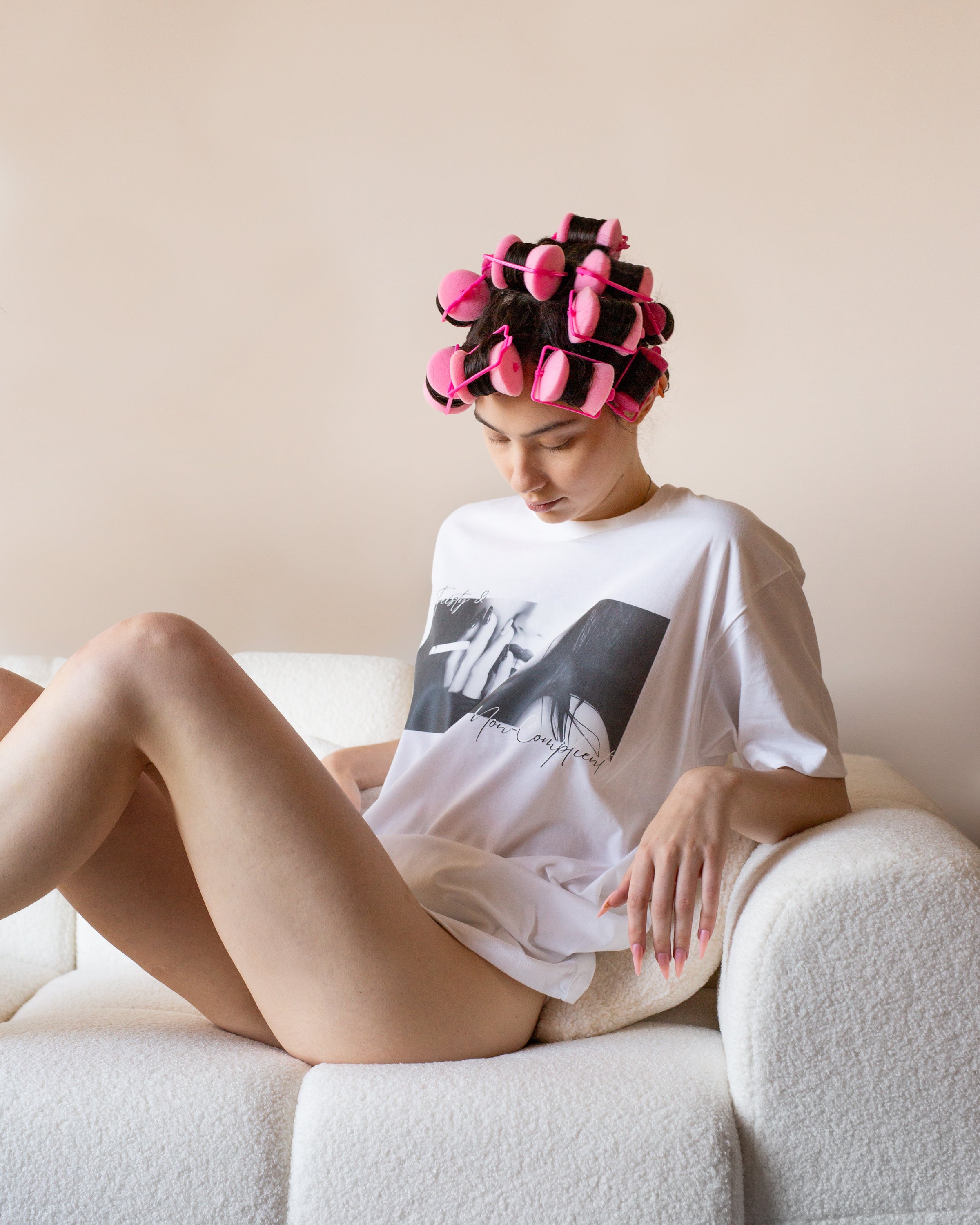 Lifestyle view of the white Feisty & Non-Compliant graphic T-shirt.
