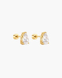 Pair of gold-tone teardrop crystal stud earrings.