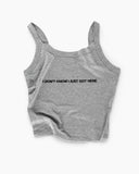 Heather-gray fitted camisole tank with thin straps and black text reading “I DON’T KNOW I JUST GOT HERE.”