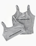 Alternate view of the heather-gray I Just Got Here camisole tank with black statement lettering.