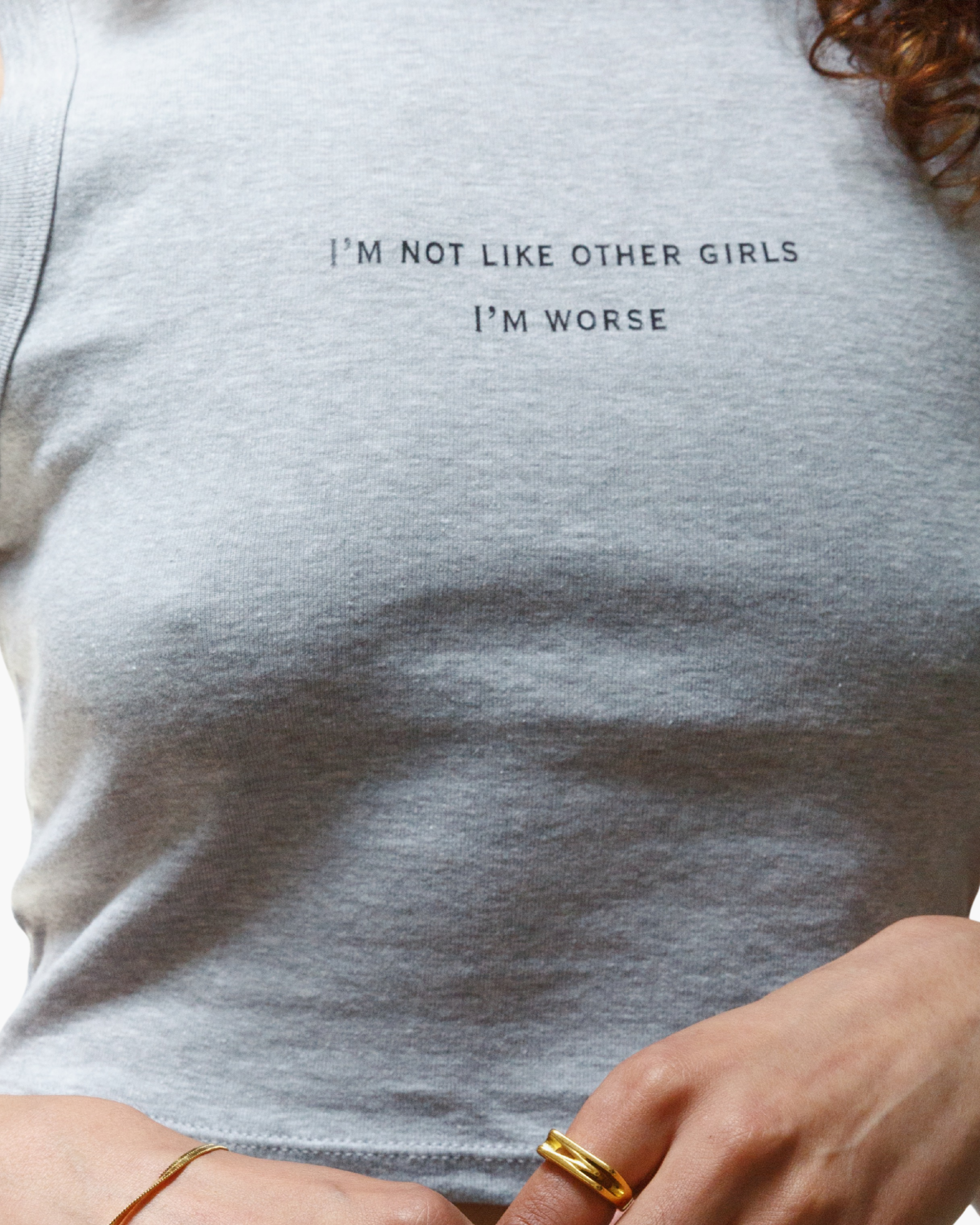 Gray cropped tank reading I’m Not Like Other Girls, I’m Worse.