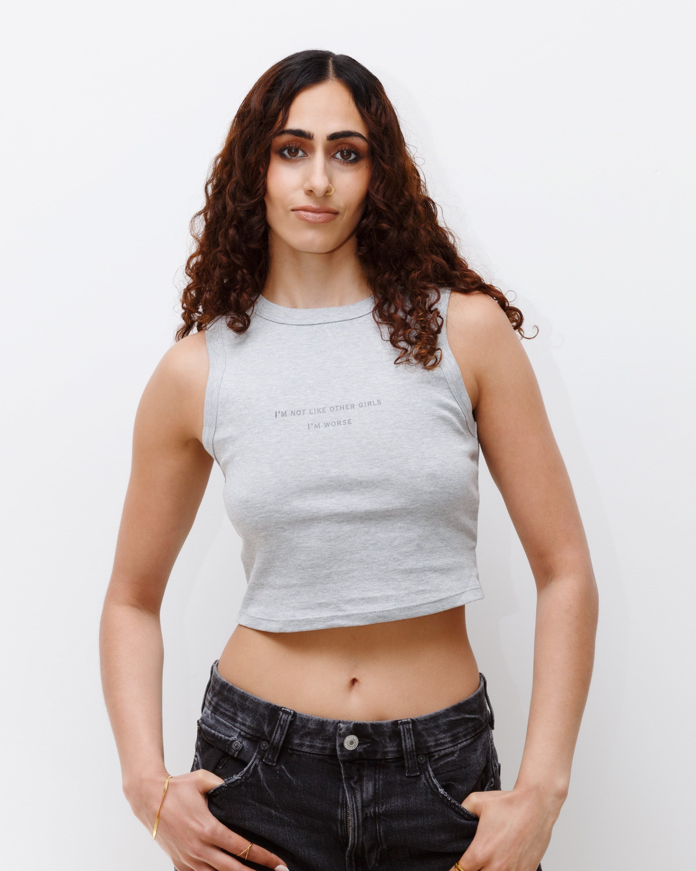 Additional lifestyle view of the heather-gray I’m Not Like Other Girls, I’m Worse cropped tank.