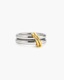 Lin two-tone ring with polished silver-tone bands connected by curved gold-tone loops on a white background.