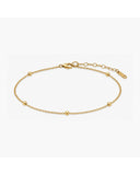 Lysa Bracelet, a skinny beaded 18K Gold PVD clasp bracelet.