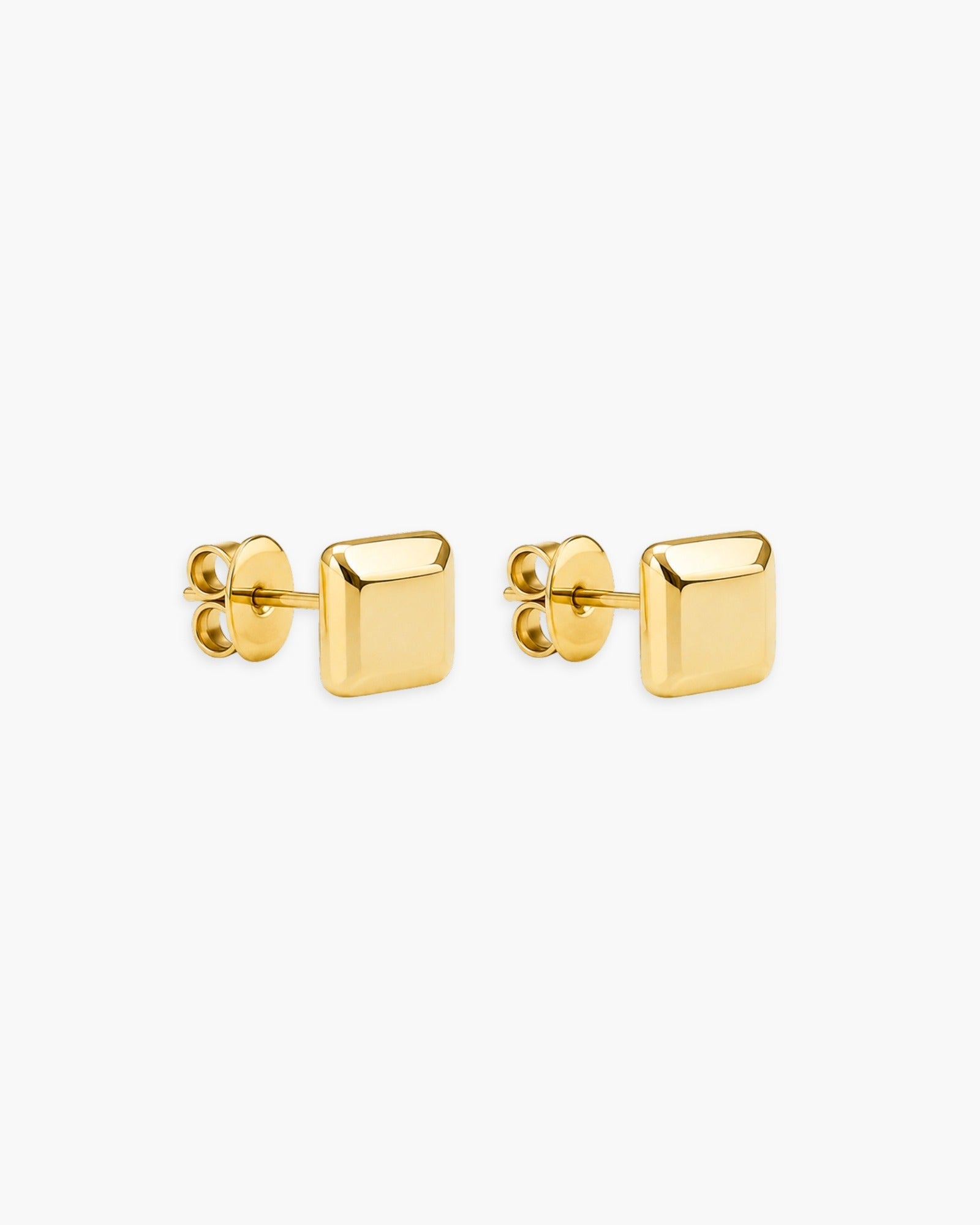 Pair of polished gold-tone square dome stud earrings.