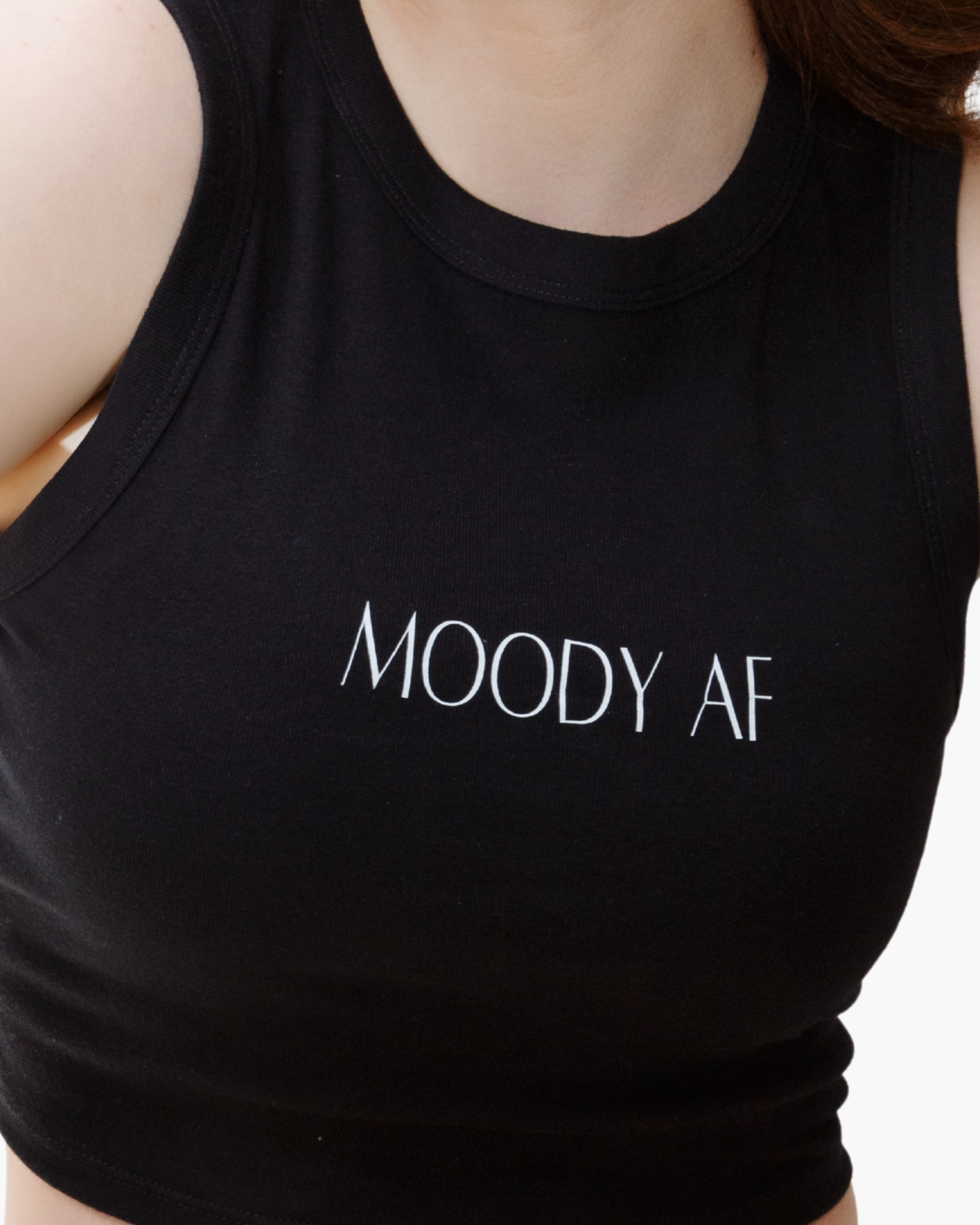 Black tank top reading MOODY AF.