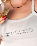 Close-up of the white Need Money for Martinis cami tank styled with a martini glass.