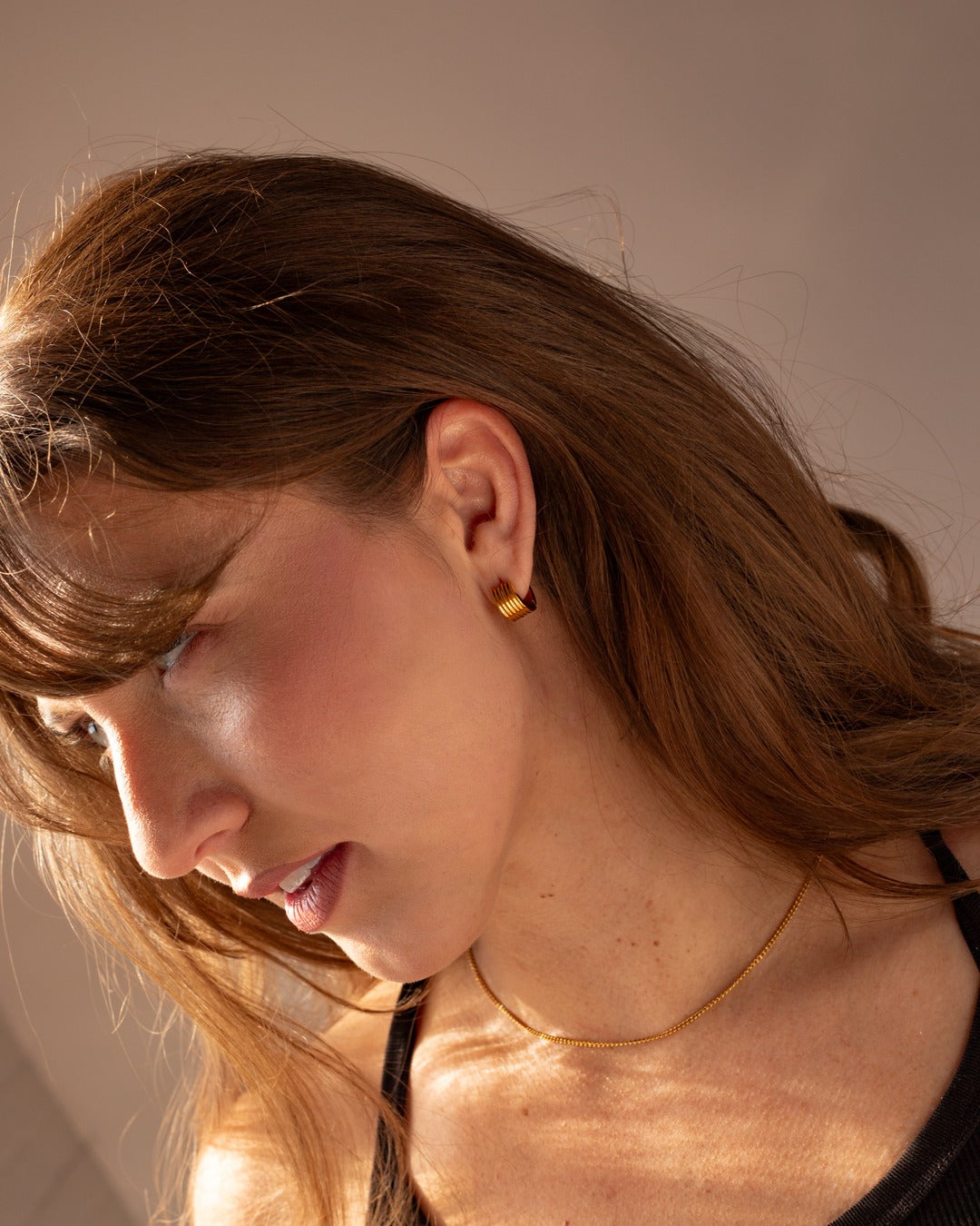 Nymph Chain worn in a warm-light lifestyle view.