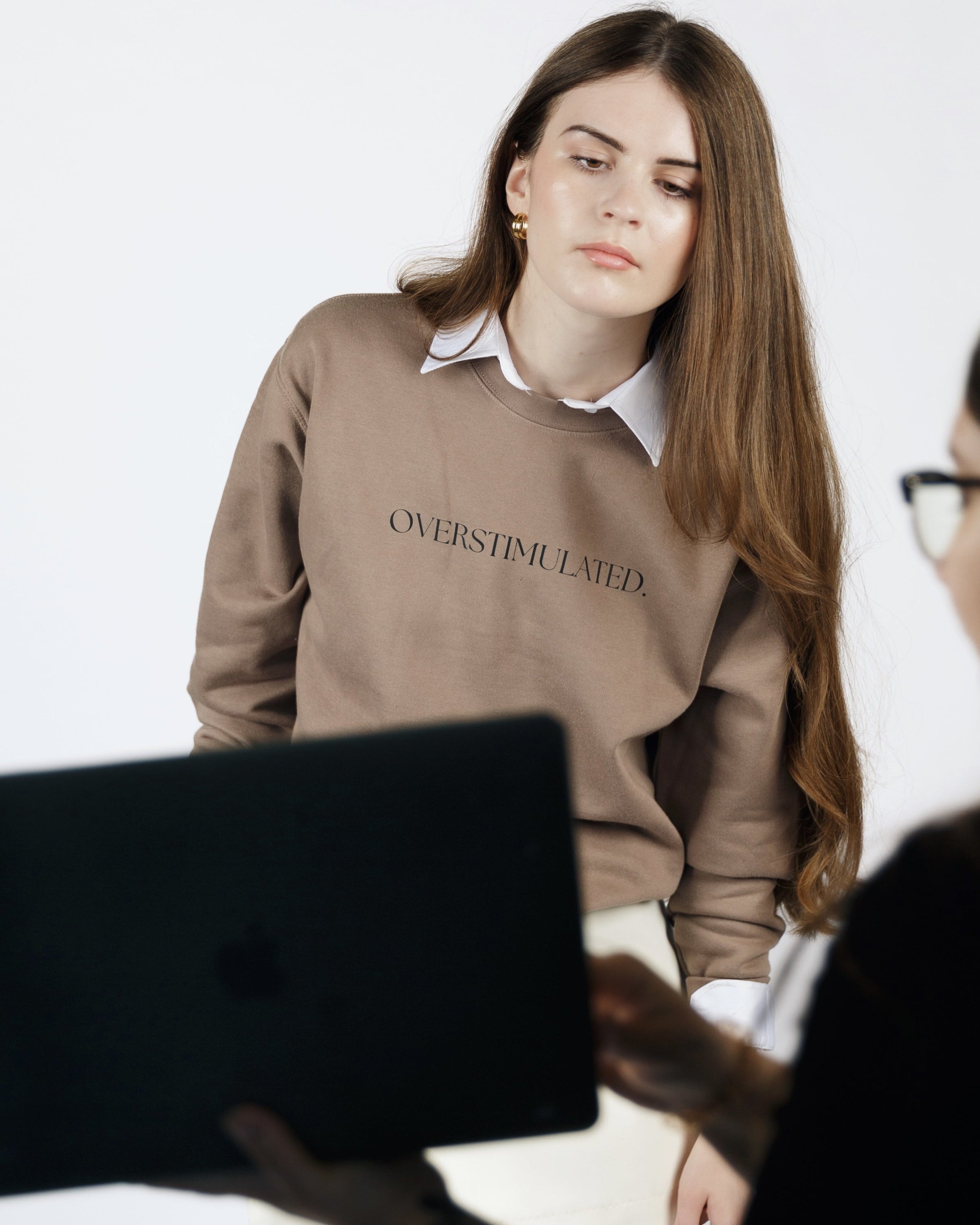 Supporting image of the warm brown Overstimulated crewneck sweatshirt.