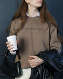 Warm brown Overstimulated crewneck sweatshirt worn by a model.