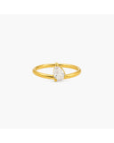 Gold-tone Rene split-band ring with a vertically set pear-shaped clear stone on a white background.