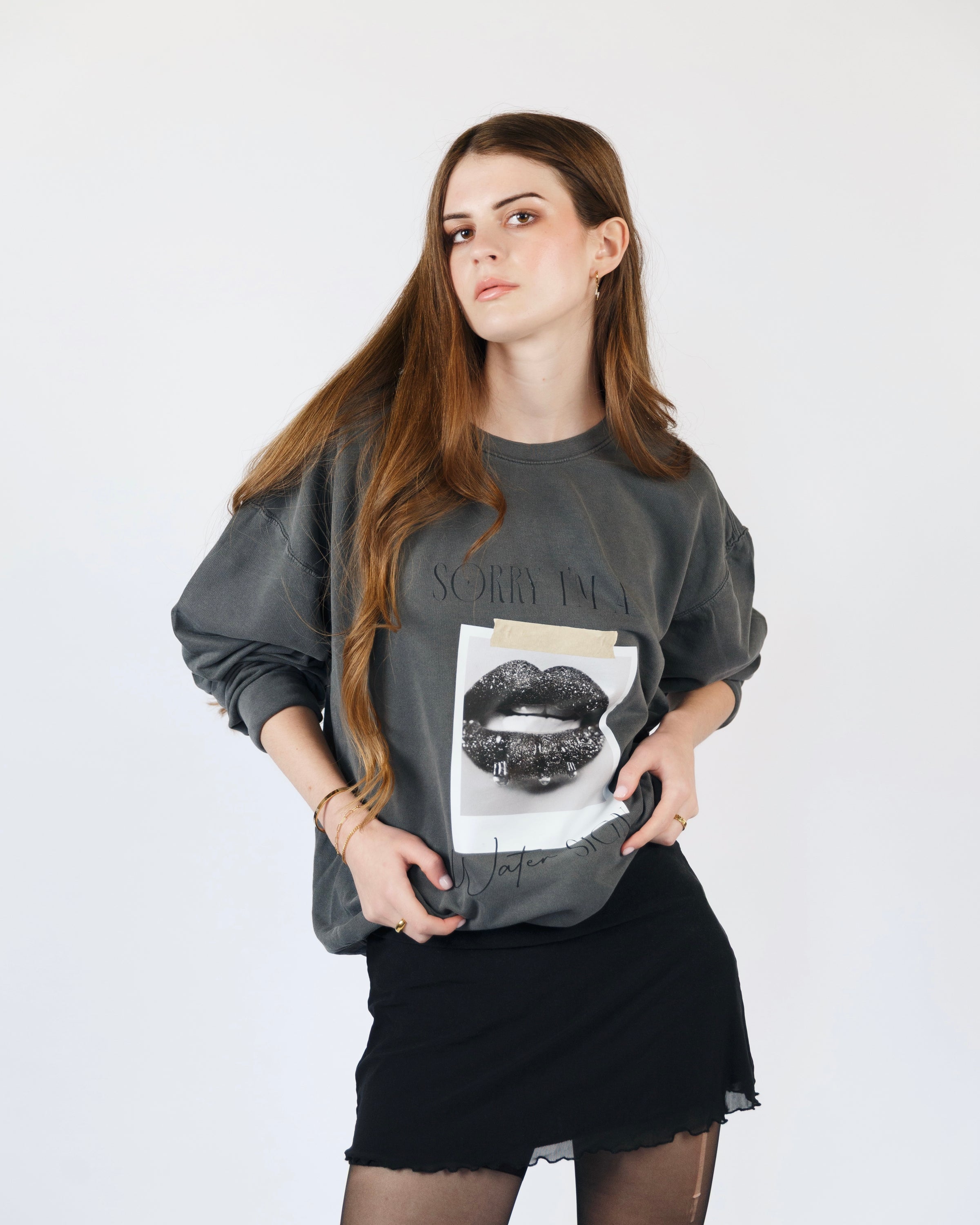 Additional model view of the washed charcoal Sorry I’m a Water Sign crewneck sweatshirt.