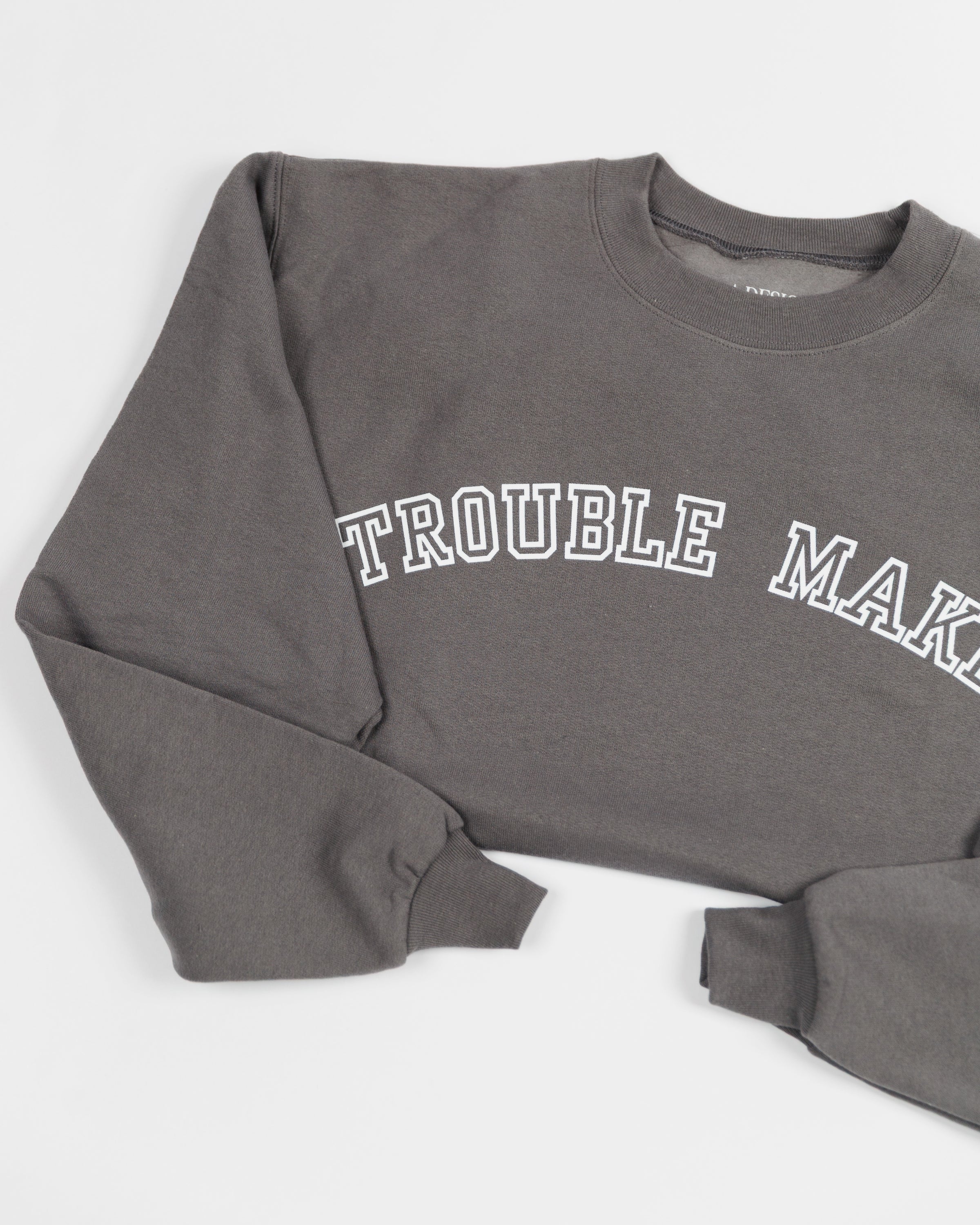 Additional view of the charcoal Trouble Maker crewneck sweatshirt.