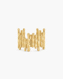 Wide polished gold-tone Vivi Ring formed from overlapping organic ridges with a sculptural molten-metal appearance on a white background.