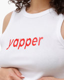 White cropped tank with red yapper lettering.
