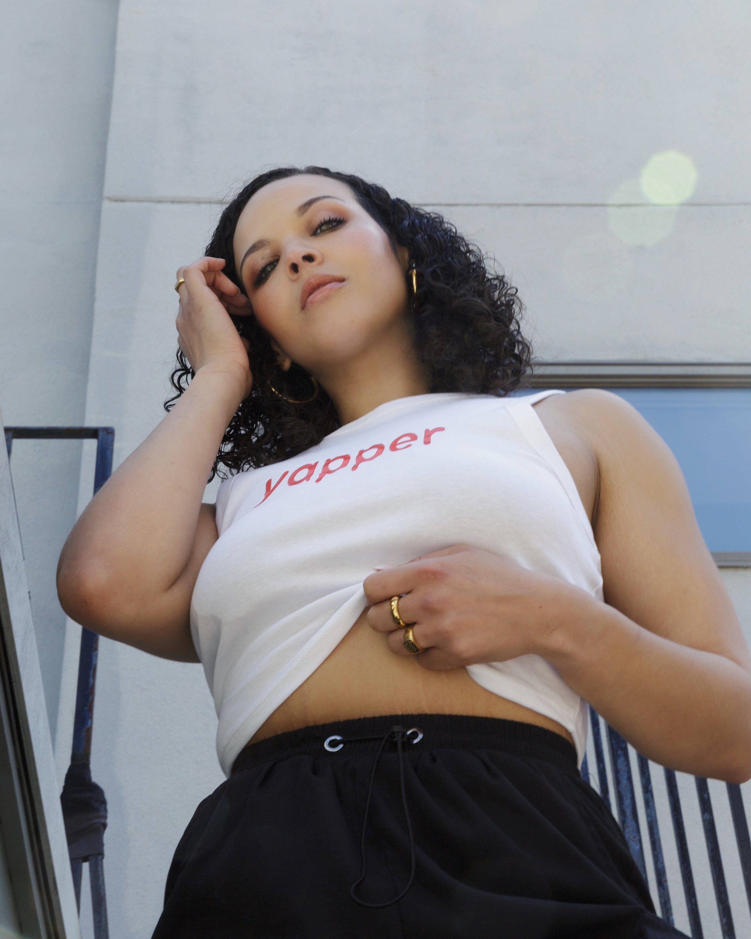 Additional lifestyle view of the white Yapper cropped tank.