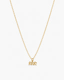 Gold-tone Aquarius zodiac pendant necklace on a fine adjustable chain.