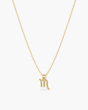 Gold-tone Scorpio zodiac pendant necklace on a fine adjustable chain.